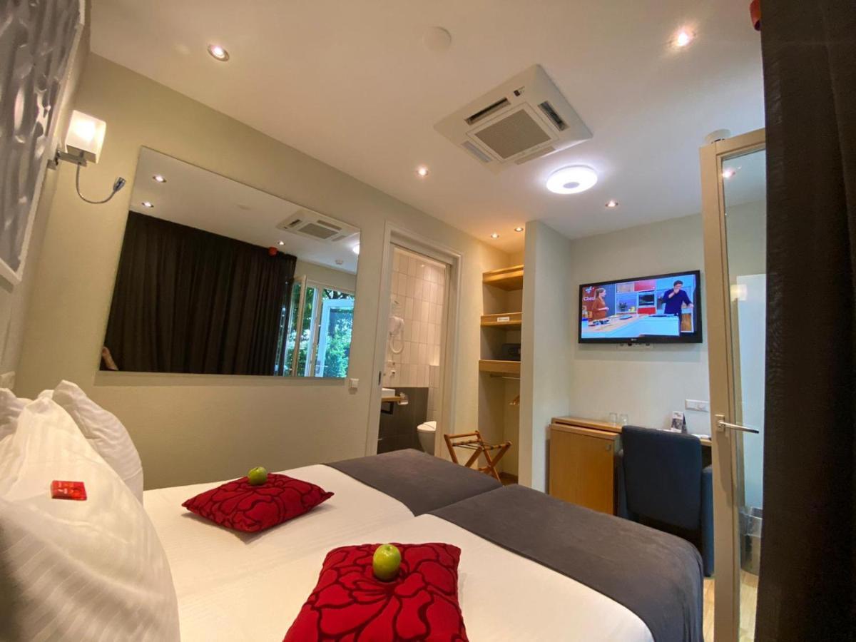 Alp Hotel Amsterdam Bagian luar foto