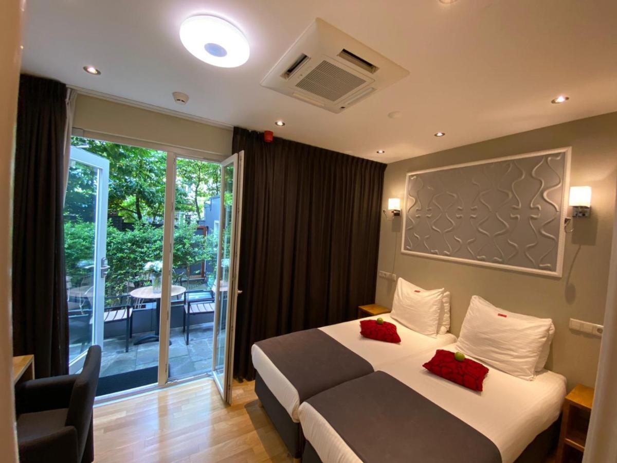 Alp Hotel Amsterdam Bagian luar foto