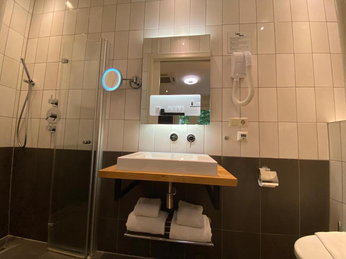 Alp Hotel Amsterdam Bagian luar foto
