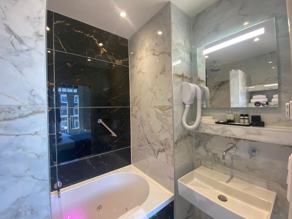 Alp Hotel Amsterdam Bagian luar foto