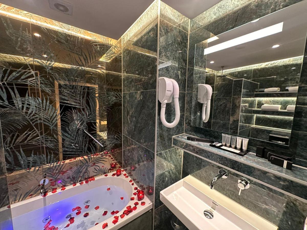Alp Hotel Amsterdam Bagian luar foto