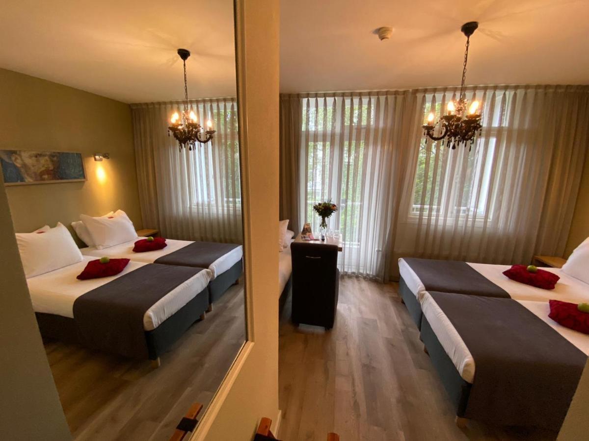 Alp Hotel Amsterdam Bagian luar foto